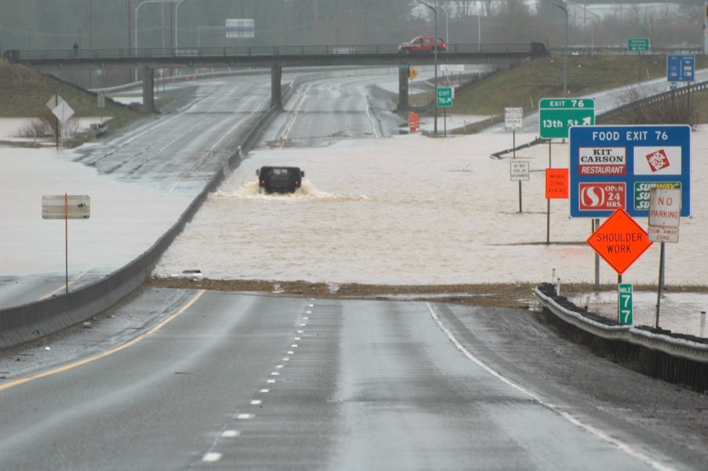 A photograph showing flooding on Interstate 5 at 13th Street in Chehalis.